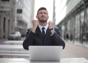 Photo by Andrea Piacquadio on <a href="https://www.pexels.com/photo/man-in-black-suit-sitting-on-chair-beside-buildings-3778966/" rel="nofollow">Pexels.com</a>